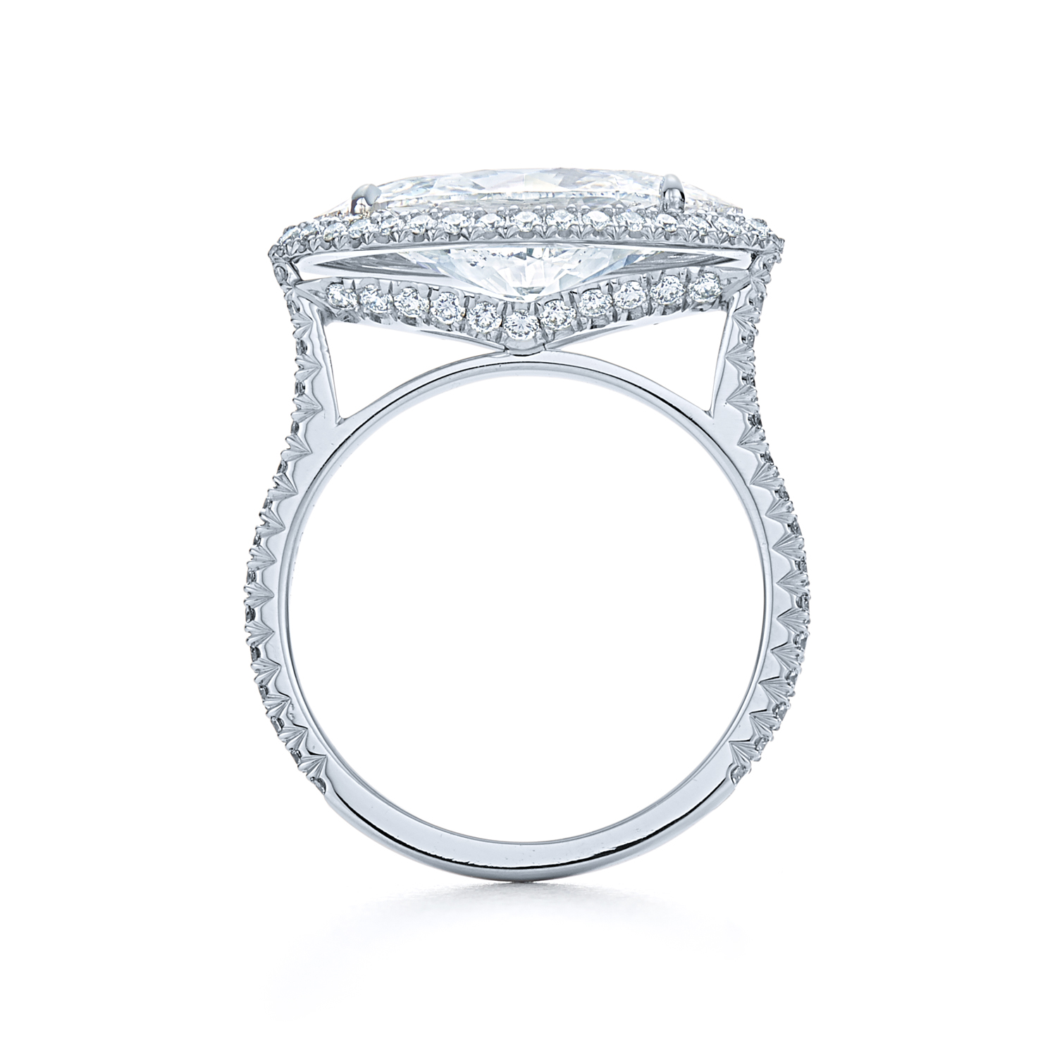 Marquise diamond ring with pave diamond halo. Set in platinum. Kwiat